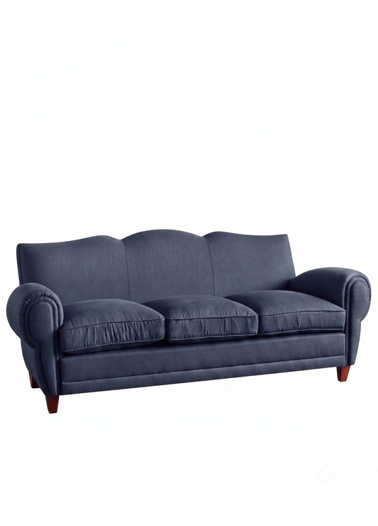 Sofá Augusto de líneas curvas y elegancia escultórica, tapizado en color azul - Tienda de Banquitos