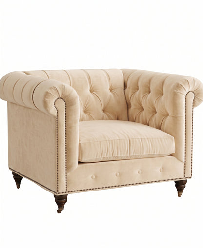 Sillón de un cuerpo Chesterfield color Vainilla en pana antimanchas importada, el clásico diseño inglés firme con detalle de tachas — el clásico de siempre para un living con personalidad. Hecho a medida por Tienda de Banquitos.