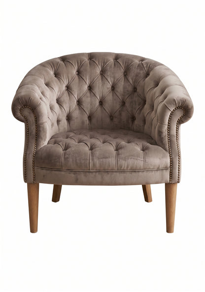 Sillón Nairobi de un cuerpo tapizado en visón, capitoné redondeado con tachas y patas de madera – Tienda de Banquitos