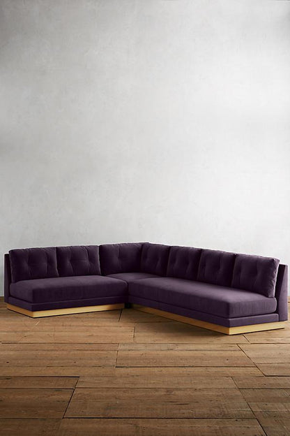 Sillon esquinero cardiff color violeta de tienda de banquitos en espacio minimalista