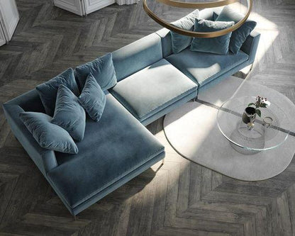 Sillon esquinero florence de tienda de banquitos en living minimalista con mesa ratona transparente