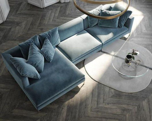 Sillon esquinero florence de tienda de banquitos en living minimalista con mesa ratona transparente