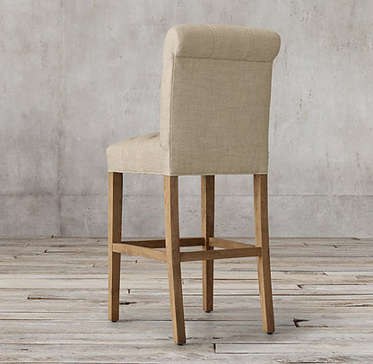 Banqueta Alta Venet beige vista de espaldas, con travesaños apoyapiés