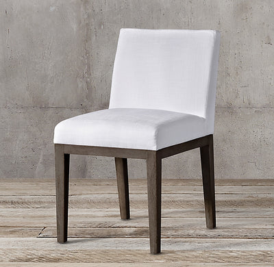 silla de comedor lisa en pana antimancha importada color blanco con patas de madera lustre roble oscuro 