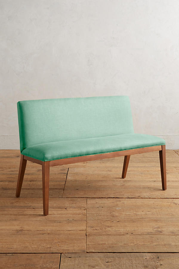 Silla Doble Nude tapizada en verde agua, con patas de madera