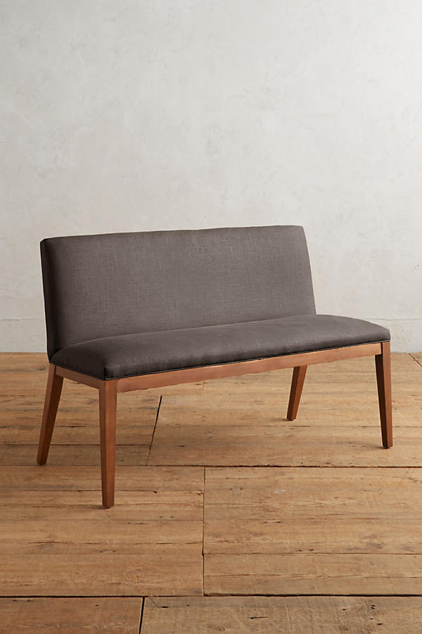 Silla Doble Nude tapizada en gris oscuro, con patas de madera