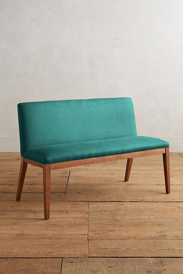 Silla Doble Nude tapizada en turquesa, con patas de madera