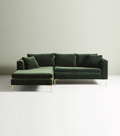 Sillón esquinero Magnolia en verde, vista de frente con el chaise longue a la izquierda