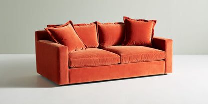 Sofá Thomas de 2 o 3 cuerpos color terracota, vista de tres cuartos con almohadones sueltos - Tienda de Banquitos